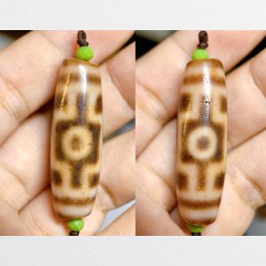 Dzi bead 2 mắt hàng A thân ngọc vân chữ thập bao quanh hiếm gặp