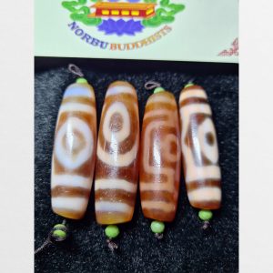 Dzi bead đá thiên châu 3 mắt và 2 mắt thân mã não ngọc dài đỏ rực thấu quang