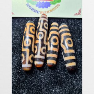 Dzi bead thiên châu 9 mắt và 3 mắt thân dài hàng B với chu sa đỏ đậm đặc nổi bật