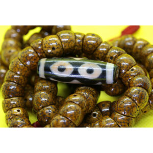 Dzi bead 3 mắt thân ngọc A