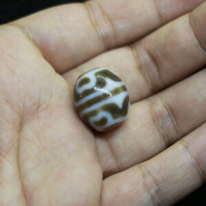 Dzi bead tròn vân hoa sen chu sa từ Tibet