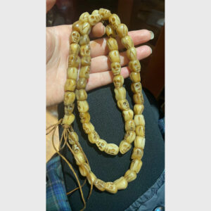 Chuỗi xương yak hình sọ màu vàng nhạt đẹp