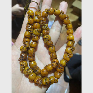 Chuỗi xương yak khắc hình sọ chất đẹp đậm màu