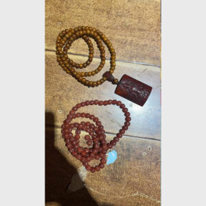 Chuỗi xương yak khắc mặt Phật và chuỗi liuli bí ngô đỏ