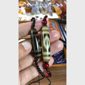 Dzi bead 2 mắt Phật đeo 15 năm chất đẹp từ Lhasa hiếm gặp